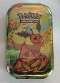 Pokemon TCG Prismatic Evolution Mini Tin Random Art New Sealed - Image 1