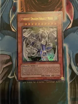 NM Yugioh! Stardust Dragon/Assault Mode DPCT-EN001 Ultra Rare - Image 1