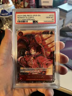 One Piece TCG OP05 Monkey D. Luffy 1st Anniversary ST01-012 PSA 10 - Image 1