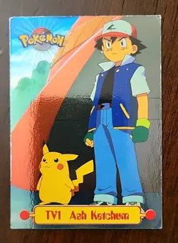 DMG! Ash Ketchum - Character Card - 1999 Topps Pokemon - TV1 Blue Label - Image 1