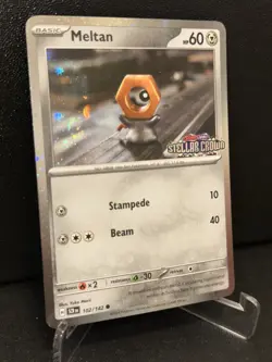 Pokemon TCG Meltan Reverse Holo Card 102/142 Stellar Crown Stamp - Image 1
