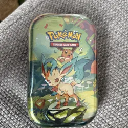 Pokemon TCG: Prismatic Evolutions Leafeon Mini Tin Factory Sealed - Image 1