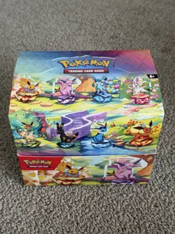 Pokemon TCG Prismatic Evolutions Mini Tin Display Box & 8 Tins, Coins, No Packs - Image 1