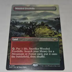 Wooded Foothills Modern Horizons 3 Rare Land Regular Borderless English Wizards… - Image 1