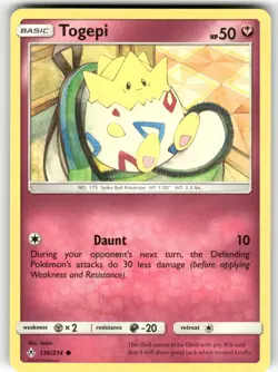 Togepi 136/214 Common Unbroken Bonds Pokemon Near Mint - Image 1