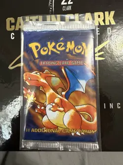 1999 Pokemon Base Set Unlimited Booster Pack Charizard art unweighed - Image 1