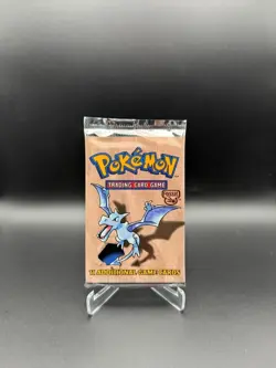Pokemon Cards Pokemon 1999 Sealed Fossil Booster Pack and Camorant V PSA Graded - Image 1