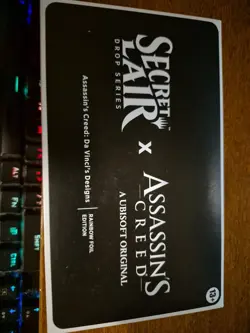Secret Lair x Assassin’s Creed: Da Vinci’s Designs SLD MTG Sealed Rainbow FOIL - Image 1