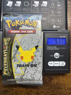 Heavy 9.77g Pokemon Sealed Celebrations 25th Anniversary Booster Pack - Image 1