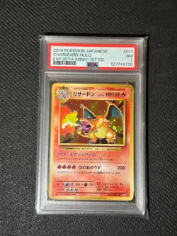PSA 7 Charizard 1st Edition Holo 11 Pokemon 2016 - Image 1