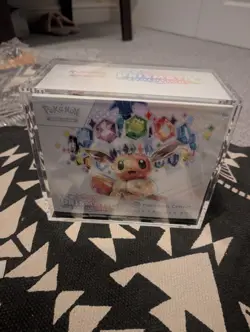 Pokemon Center ETB Prismatic Evolutions Sealed with Acrylic Case - Image 1