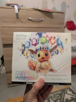 Pokemon Center ETB Prismatic Evolutions Sealed with Acrylic Case - Image 3