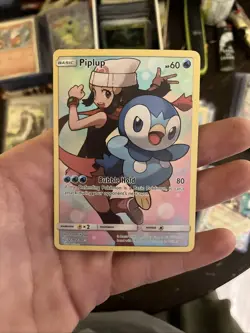 Pokemon TCG Piplup Holo Secret Rare Card Sun & Moon Cosmic Eclipse 239/236 - Image 1