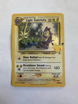 POKEMON LIGHT TOXTRICITY SWSH 137 PROMO BLACK STAR COSMOS HOLOFOIL NM CARD - Image 1