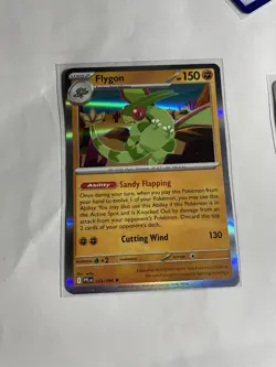 Flygon - ME02: Phantasmal Flames 053/094 Holo NM Pokemon TCG - Image 1