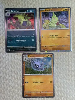 Pokemon PAL 110/193 Larvitar, 111/193 Pupitar, Tyranitar 135/193 Cosmos Holos - Image 1