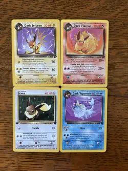 Eevee Jolteon Flareon Vaporeon Team Rocket Set Pokemon TCG - Image 1