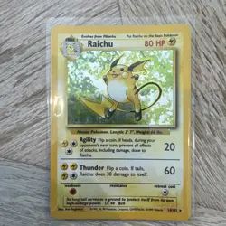 The Pokemon Company Raichu 14/102 Base Set Holo Rare English Pokemon Card - Image 1