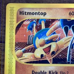 Hitmontop 82/147 Common Aquapolis Non Holo Pokemon Card LP Top Loader Included - Image 2