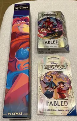 ⭐NEW Disney Lorcana Fabled Bundle: 1-Play Mat, 1-Starter Deck, and 1-Booster⭐ - Image 1