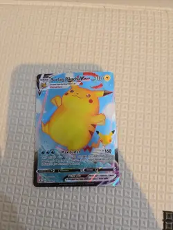 Pokemon TCG Surfing Pikachu VMAX Celebrations 009/025 Holo Ultra Rare - Image 1