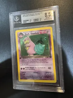 Pokemon Dark Slowbro Holo 12/82 from Team Rocket 1st Edition in a BGS 8.5 - Image 1