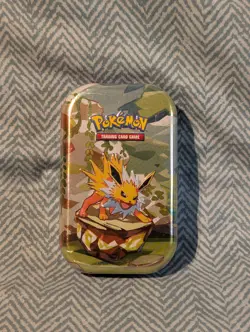 Pokemon TCG: Scartlet & Violet Prismatic Evolutions Mini Tin Jolteon New/Sealed - Image 1