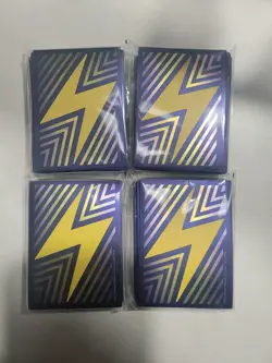 Pokemon Surging Sparks ETB 65 Lightning Bolt Card Sleeves 4 Pack - Image 1