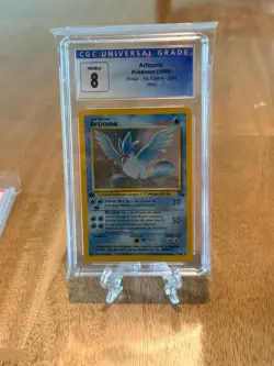 Pokemon Articuno Fossil 2/62 Holo Rare 1st Edition 1999 CGC 8 Graded Card - Image 1