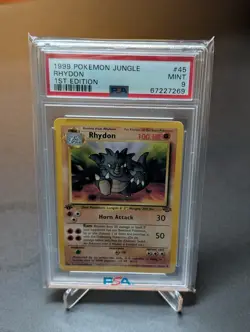 PSA 9 1999 Pokemon Jungle 1st Edition Rhydon #45 - Image 1
