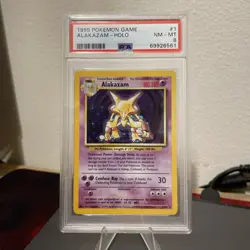 1999 Pokemon Game Alakazam-Holo 1/102 PSA 8 New Grade - Image 1