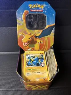 Lot of 189 non-holo Pokemon Cards + Tin (No energy or trainer cards) - Image 1