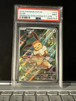 2025 POKEMON PRISMATIC EVOLUTIONS POKEMON CENTER ETB PROMO SVP #173 EEVEE PSA 9 - Image 1