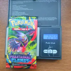 Pokemon Tcg Mega Evolution phantasmal flames Heavy 22.55g Booster Pack Sealed - Image 1