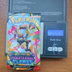 Pokemon Tcg Mega Evolution phantasmal flames Heavy 22.65g Booster Pack Sealed - Image 1