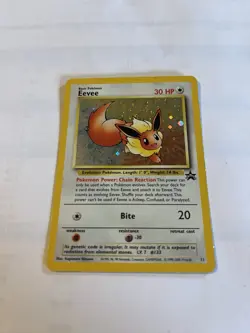 Eevee Holo Black Star Promo Card 11/53 WOTC with Swirl - Image 1