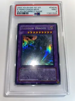 YuGiOh Rainbow Dragon Misprint Incorrect Name Ghost Rare 1st Edition PSA 9 - Image 1