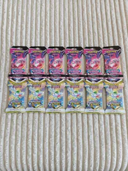 Under Market Price SWSH Pokemon Lot: 12 Sealed FS and BS Sleeved Booster Packs - Image 1