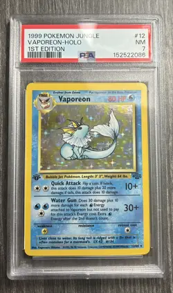 Pokemon TCG Vaporeon 12/64 Jungle 1st Edition Holo PSA 7 - Image 1