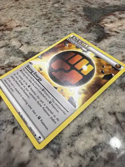 Strong Energy 104/111 Uncommon Normal FFI LP3 Nintendo Pokemon Card - Image 2