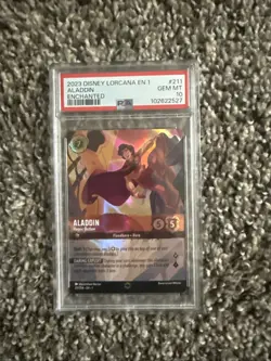 2023 DISNEY LORCANA THE FIRST CHAPTER ENCHANTED ALADDIN HEROIC OUTLAW PSA 10 - Image 1