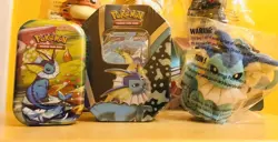 🔥2021 Pokemon Vaporeon V Tin Eevee Evolutions BUNDLE All New/Factory Sealed!🔥 - Image 1