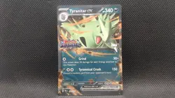 TYRANITAR EX (PRISMATIC EVOLUTIONS STAMP) 064/131 HOLO POKEMON NM - Image 1