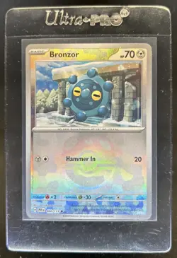 2025 Pokemon Prismatic Evolutions Bronzor Reverse Holo Master Ball #066/131 - Image 1