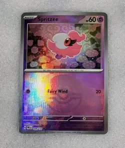 Spritzee 038/131 NM/M PRE Poke Ball Reverse SV Prismatic Evolutions Pokemon TCG - Image 1