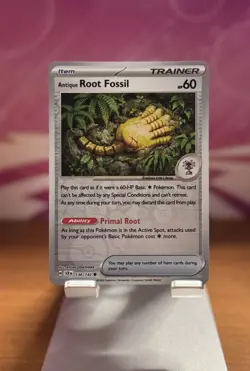 Pokemon Stellar Crown - 130/142 Antique Root Fossil Reverse Holo - Image 1