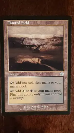 Tainted Field Torment EX/LP 140/143 MTG Magic the Gathering Land Uncommon - Image 1