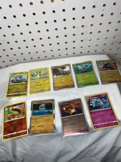 Pokemon TCG Evolving Skies Mixed Card Lot Metal Tin Case Metapod Charmander - Image 5