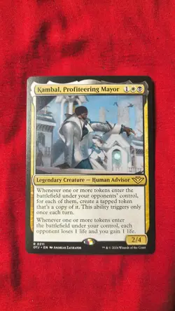 MTG Kambal, Profiteering Mayor - Outlaws of Thunder Junction (OTJ) - Image 1