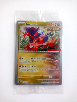 Pokemon TEF EN GameStop Stamped Promo HOLO Koraidon #119/162 - Factory Sealed - Image 1